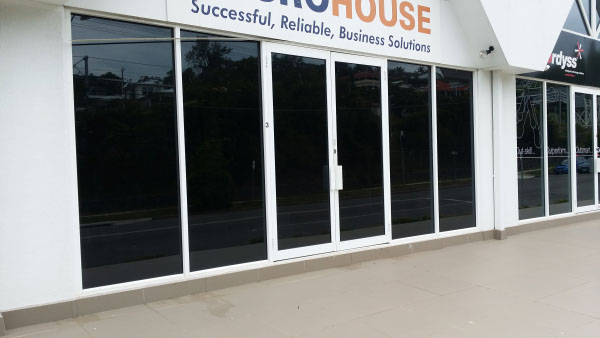 business shopfront in Brisbane after solar control window film applied for sun protection and privacy