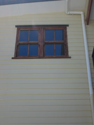 exterior of house in Strathpine Queensland wooden frame windows tinted with black solar film