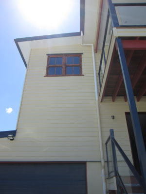 exterior view of house Strathpine Queensland windows tinted with dark solar privacy film