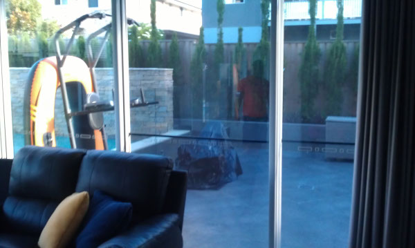 inside of Cannon Hill Brisbane home while tinting sliding door windows
