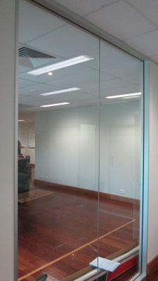office windows with clear glass before frosted window glass installation