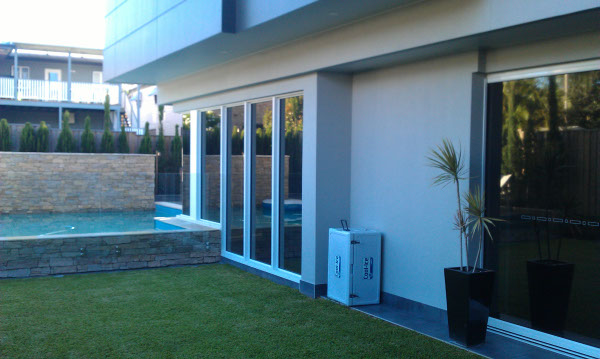 Optimus home window tinting service windows tinted outside view of house in Cannon Hill Brisbane Australia